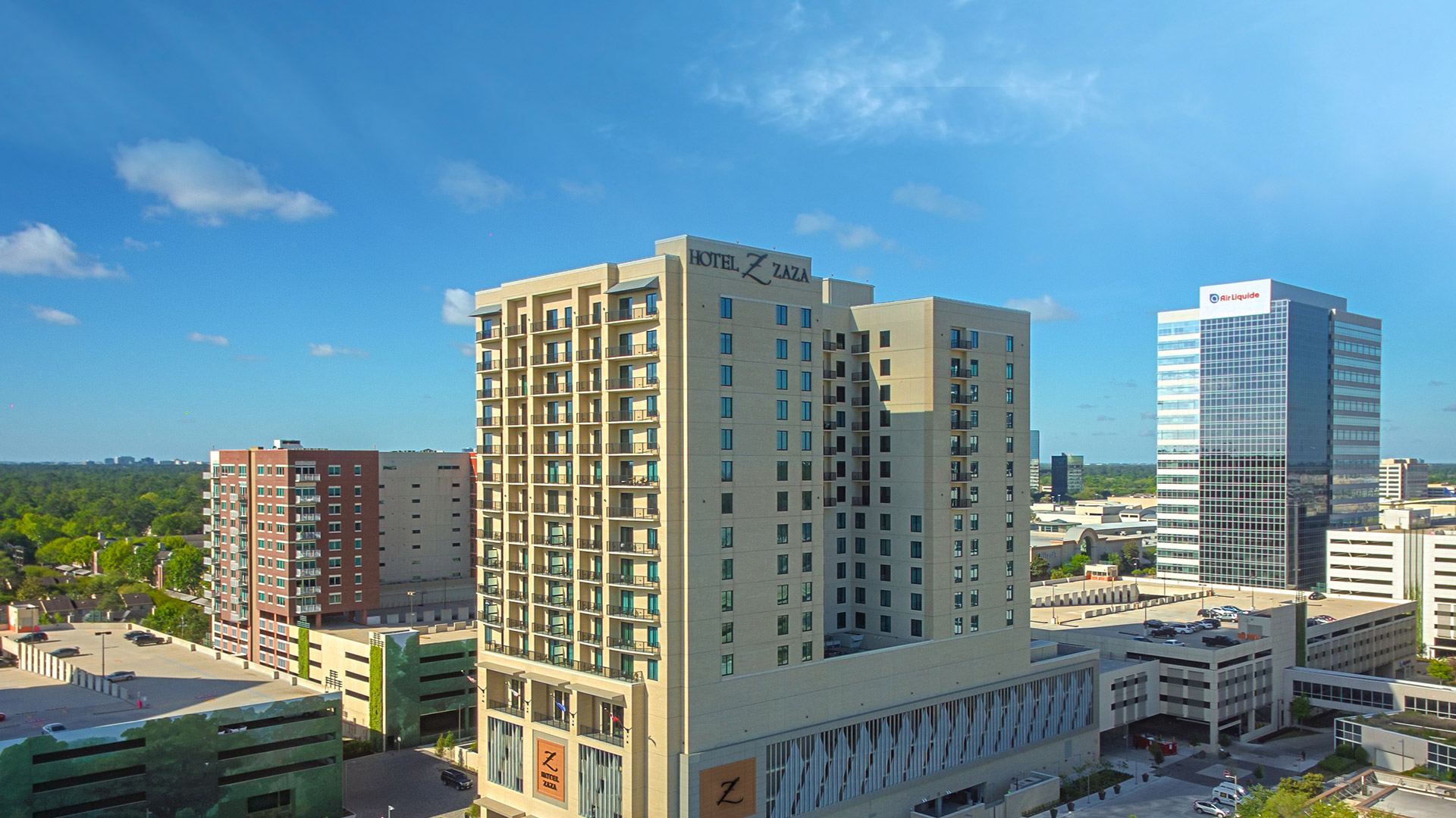 Aerial view of The McCarthy tower with the city skyline behind