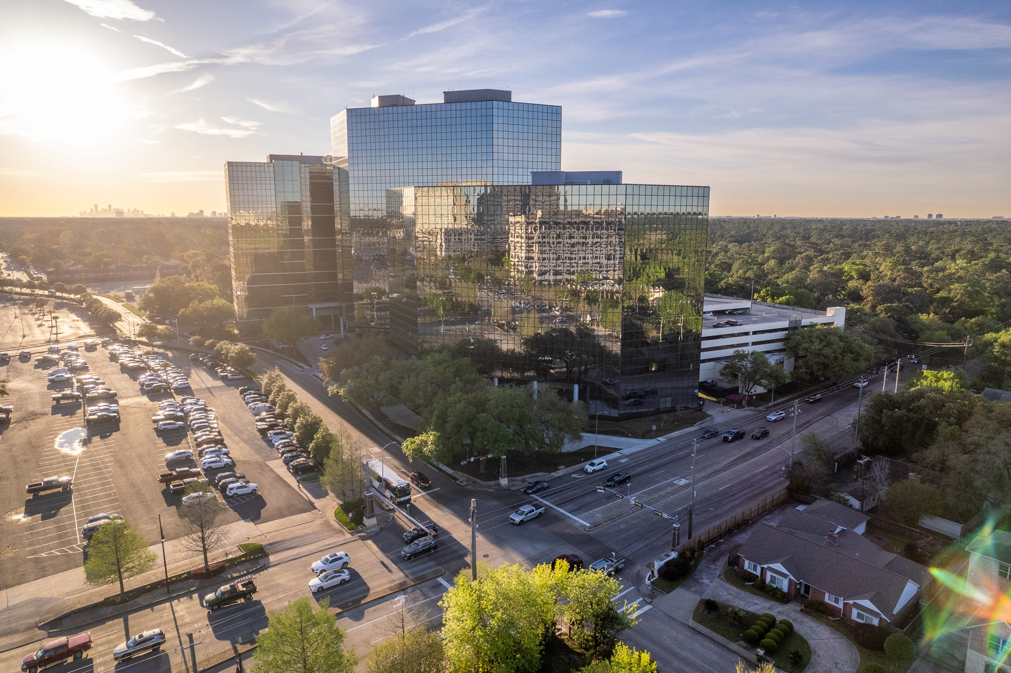 Aerial view of the office towers at 800 Gessner Road at sunset
