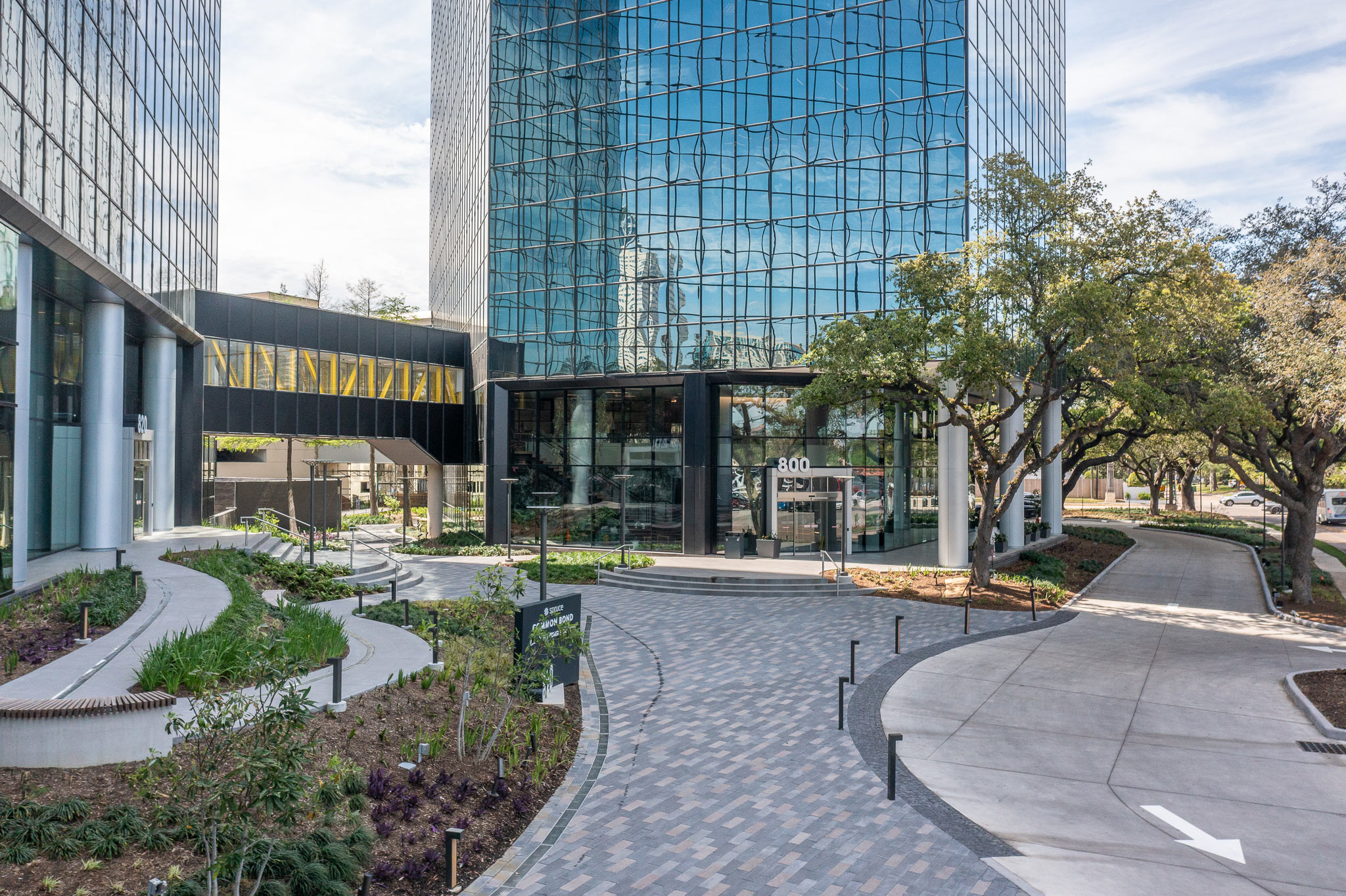 Landscaped plaza and entrance canopy at One Memorial City Plaza, 800 Gessner Road