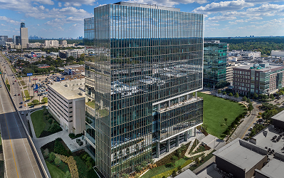 990 Aerial view of the 990 Town & Country office tower with the city skyline beyond