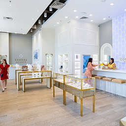 CityCentre-Retail Interior of a jewellery store at CityCentre, with lit display cases and staff assisting customers