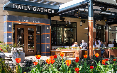 Daily Gather Exterior of Daily Gather at CityCentre, with tulips blooming in the foreground