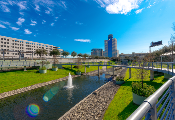 Greenside-Overview Landscaped waterway with fountains at Greenside, with office towers behind