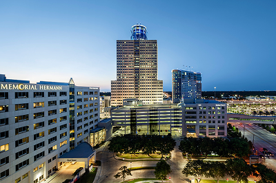 Memorial Hermann Tower and the Memorial City Medical Center campus at dusk