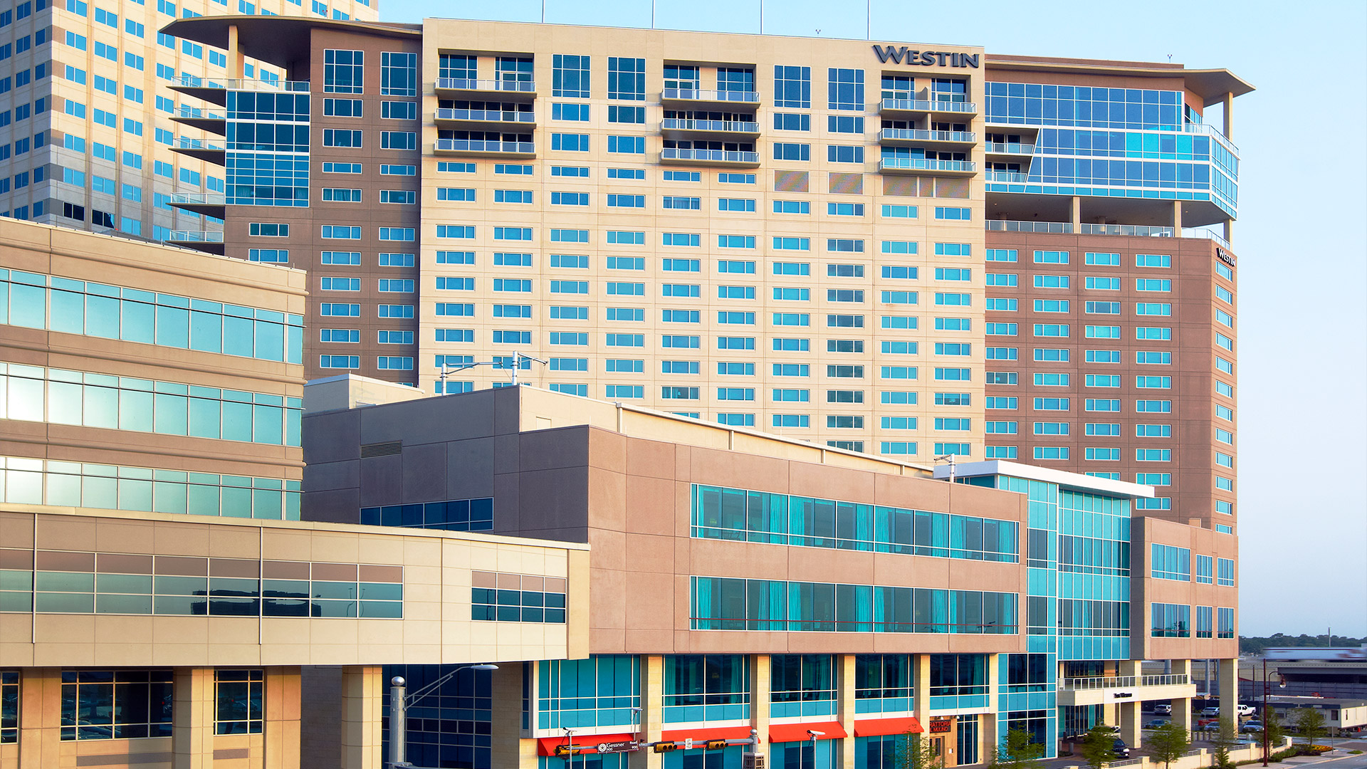 Exterior of The Westin Memorial hotel tower and the surrounding Memorial City buildings